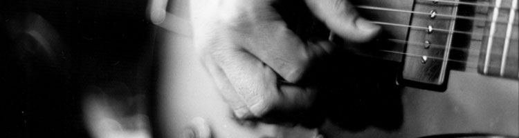 Hand And Guitar Image